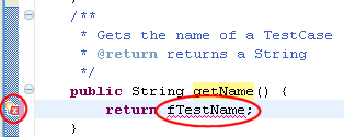 A Java editor indicating a quick-fixable problem with a lightbulb in the editor marker bar